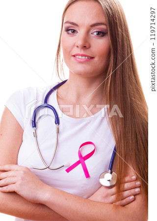 Woman with pink ribbon aids symbol and stethoscope on chest. Woman with pink ribbon aids symbol and stethoscope on chest. 119714297