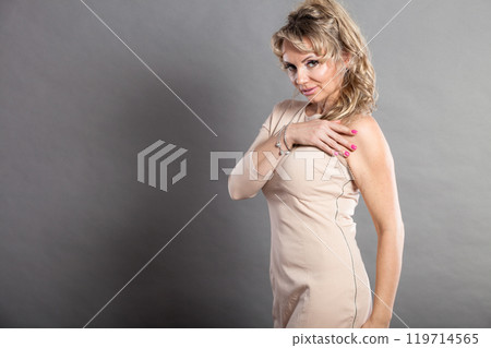 Glamour lady with beige dress. Glamour lady with beige dress. 119714565
