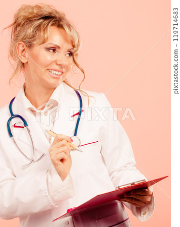 Middle aged female medical doctor. 119714683