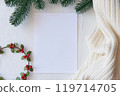 Blank Christmas Card Mockup with Holly and Cozy Decorations 119714705