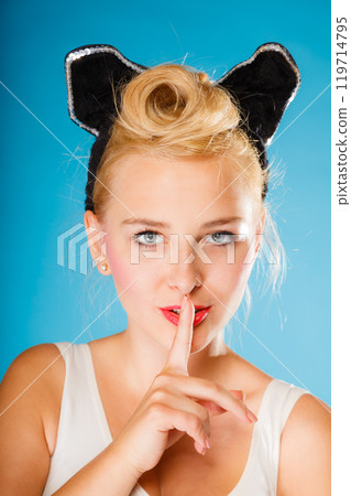 Pin up style, retro girl with silence sign. Pin up style, retro girl with silence sign. 119714795