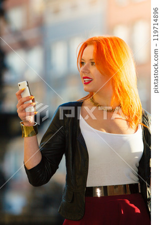 woman fashion girl with smartphone outdoor 119714896
