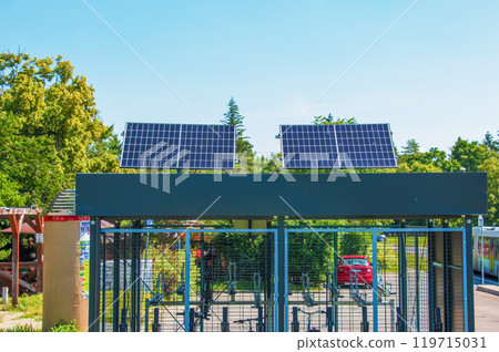 Solar panels in the bike park. Alternative energy source. Energy crisis. 119715031