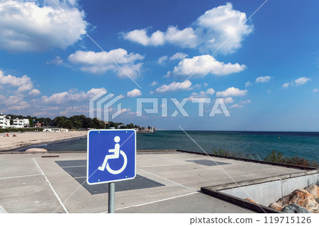 Empty parking lot for disabled people by the sea 119715126