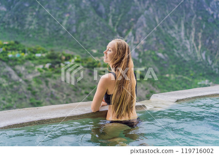 Female tourist at the hot springs of Grutas Tolantongo, Mexico. Adventure, relaxation, and natural wellness concept 119716002