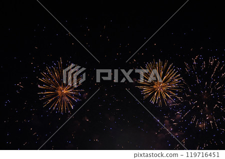 Fireworks on the dark sky background at festival. 119716451