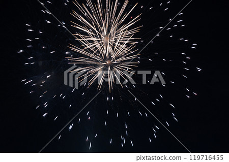 Fireworks on the dark sky background at festival. 119716455