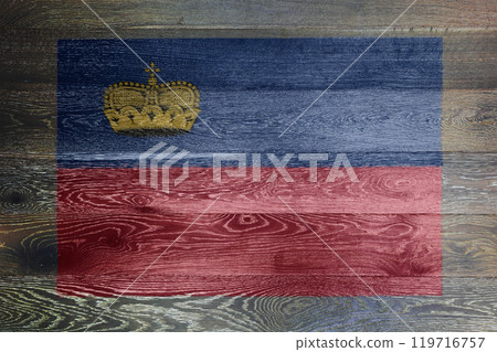 Liechtenstein flag on rustic old wood 119716757