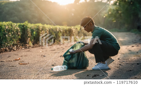 Man collecting plastic trash 119717610