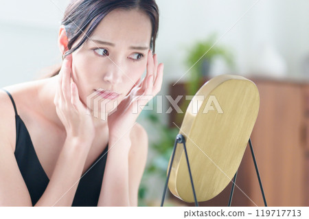 Women suffering from skin problems 119717713