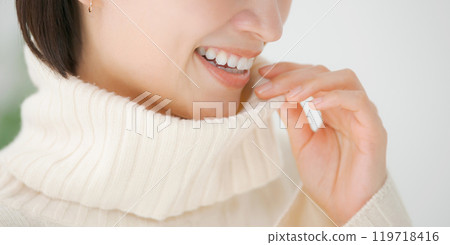 Close-up of a woman's mouth with short hair Close-up of a woman's mouth with short hair 119718416