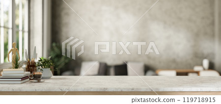 A close-up of a minimalist stone tabletop with a blurred background of a contemporary living room. 119718915
