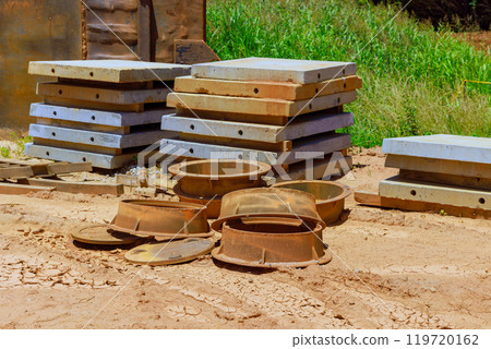 Top edge of manhole for an underground utility pit at construction site 119720162