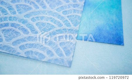 Japanese paper texture, simple background in blue with traditional patterns and blurs Japanese paper texture, simple background in blue with traditional patterns and blurs 119720972