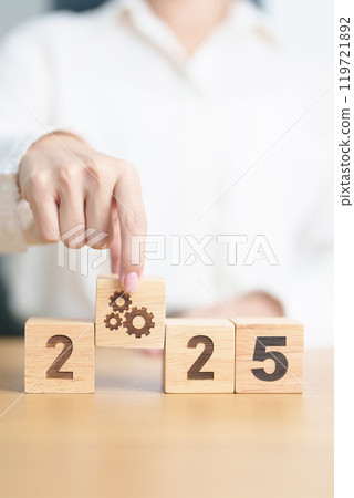 2024 year change to 2025 year block with gear icon. Business Process, Team, teamwork, Goal, Target, Resolution, strategy, plan, Action, motivation, change, brainstorm and New Year start concepts 2024 year change to 2025 year block with gear icon. Business Process, Team, teamwork, Goal, Target, Resolution, strategy, plan, Action, motivation, change, brainstorm and New Year start concepts 119721892