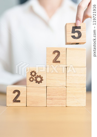 2025 year block with gear icon. Business Process, Team, teamwork, Goal, Target, Resolution, strategy, plan, Action, motivation, change, brainstorm and New Year start concepts 119721916