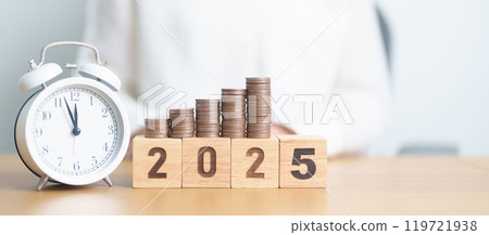 Happy New Year 2025 with clock and coins stack arrangement. Money Saving for Future Plan, Retirement fund, Pension, Investment, Wealth Business, Financial and countdown concepts 119721938