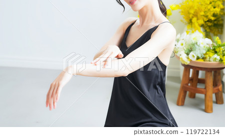 Skin care image of a woman's arm Skin care image of a woman's arm 119722134