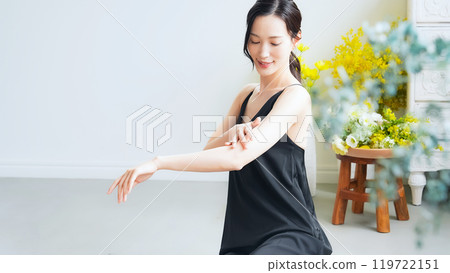 Skin care image of a woman's arm Skin care image of a woman's arm 119722151