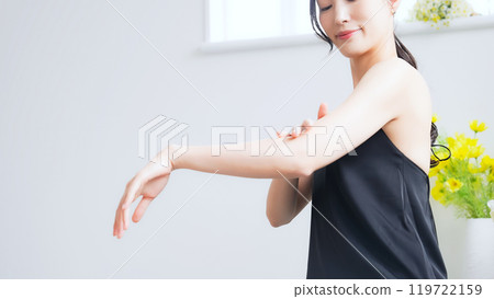Skin care image of a woman's arm 119722159