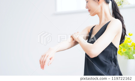 Skin care image of a woman's arm 119722162