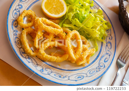 Calamares a la romana fried squid on plate. Traditional spanish dish 119722233