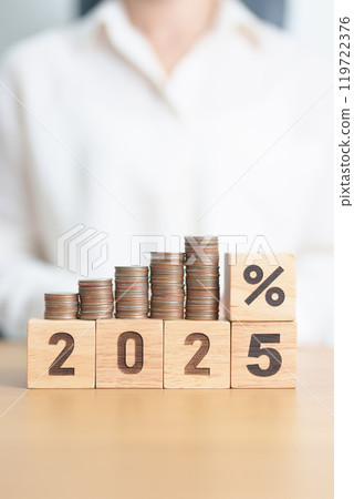 2025 New year with percentage with coin stack. Interest rate, GDP, stocks market, financial, deflation and Inflation, mortgage, debt, Loan and Economic Recession 119722376