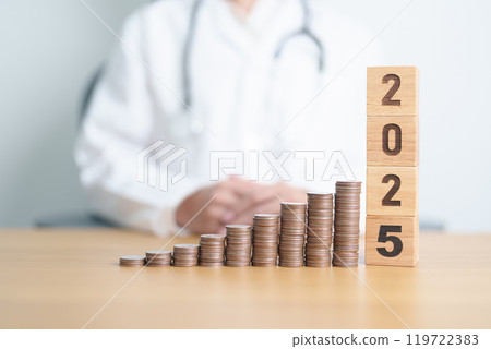Happy New Year 2025 with Doctor and coins stack. Money stack Counting arrangement for deposit, Healthcare cost, Money Saving, Health Insurance, Medical, Donation and Financial concept 119722383