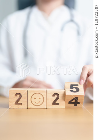 2024 end year to Happy New Year 2025 with Smile block against doctor. Health, Healthcare insurance, medical Satisfaction, feedback, Review, mental health, wellbeing, wellness and good year concept 119722387