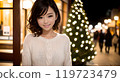 Woman enjoying shopping on Christmas night 119723479