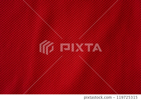 Close up of red football jersey sports clothing fabric texture. Close up of red football jersey sports clothing fabric texture. 119725315