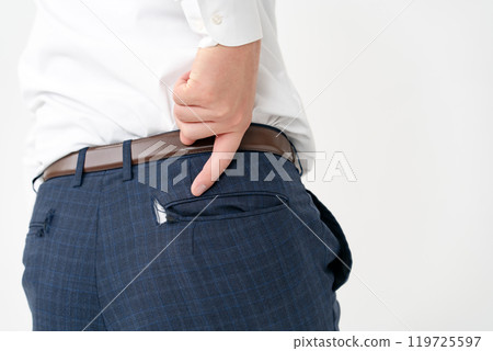Businessman, male in his 20s, pants torn 119725597