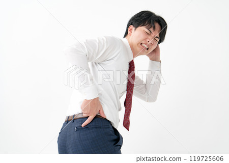 Businessman, male in his 20s, pants torn Businessman, male in his 20s, pants torn 119725606