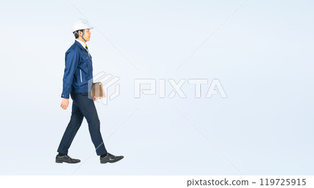 Full body photo of a walking male worker Full body photo of a walking male worker 119725915