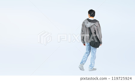 Full-body photo of a man in casual clothing walking from behind 119725924