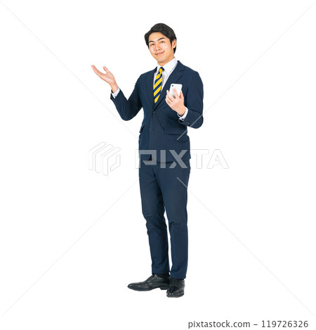 A young male business person giving directions with a smartphone. A transparent full-body photo PNG precisely cut by hand A young male business person giving directions with a smartphone. A transparent full-body photo PNG precisely cut by hand 119726326
