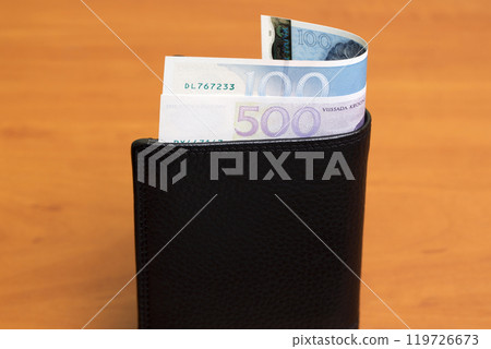 Estonian kroon in the black wallet Estonian kroon in the black wallet 119726673