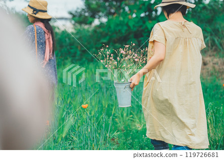 Picking flowers at a flower farm 119726681