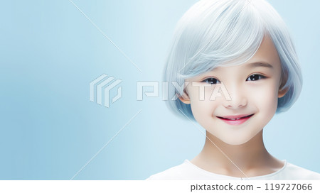Portrait of smiling asian girl child with short white hair blue background. 119727066