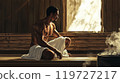 Men entering the sauna 119727217