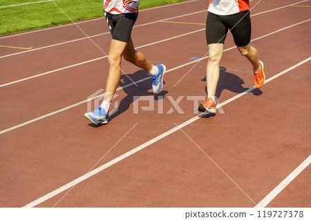 Sports runners on the running track. Sport, stadium concept. 119727378