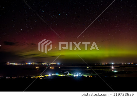 The Aurora Borealis, the northern lights, showing up above Maghery, Burtonport, Arranmore and Dungloe in County Donegal, Ireland. The Aurora Borealis, the northern lights, showing up above Maghery, Burtonport, Arranmore and Dungloe in County Donegal, Ireland. 119728659