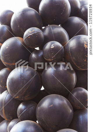 Artificial plastic berries of clusters of black grapes close -up 119728934