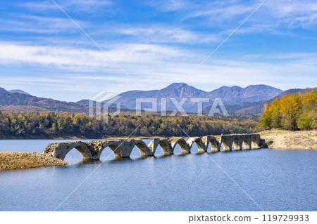 Taushubetsu River Bridge on the former Shihoro Line of the Japanese National Railways on a clear autumn day in Kamishihoro, Hokkaido 119729933
