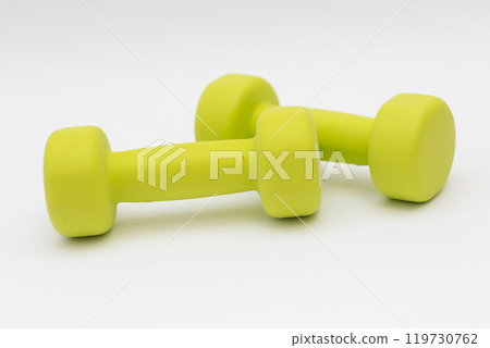 Green dumbbells 1 kg. isolated on white background. 119730762