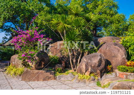 beautiful Asian garden with stones in summer in Vietnam beautiful Asian garden with stones in summer in Vietnam 119731121