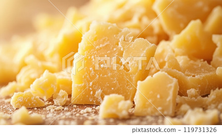 Close up of Crumbly and Rubbery Textured Gourmet Cheese on a Rustic Background Close up of Crumbly and Rubbery Textured Gourmet Cheese on a Rustic Background 119731326