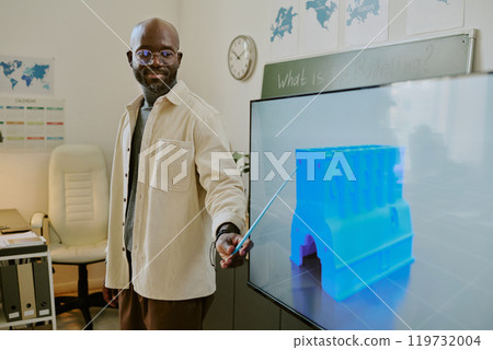 African American educator explaining 3D printing process in modern classroom setting, using large digital screen for visual aid, conveying knowledgeable and professional demeanor African American educator explaining 3D printing process in modern classroom setting, using large digital screen for visual aid, conveying knowledgeable and professional demeanor 119732004