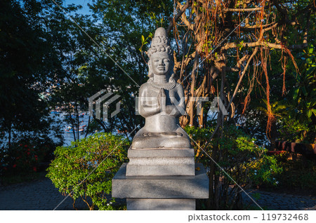 Buddhist statue of a female deity in park at pagoda at the Cham Towers in Nha Trang, Vietnam 119732468
