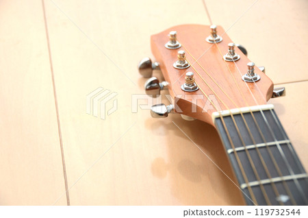Acoustic guitar neck pegs close-up, music image Acoustic guitar neck pegs close-up, music image 119732544